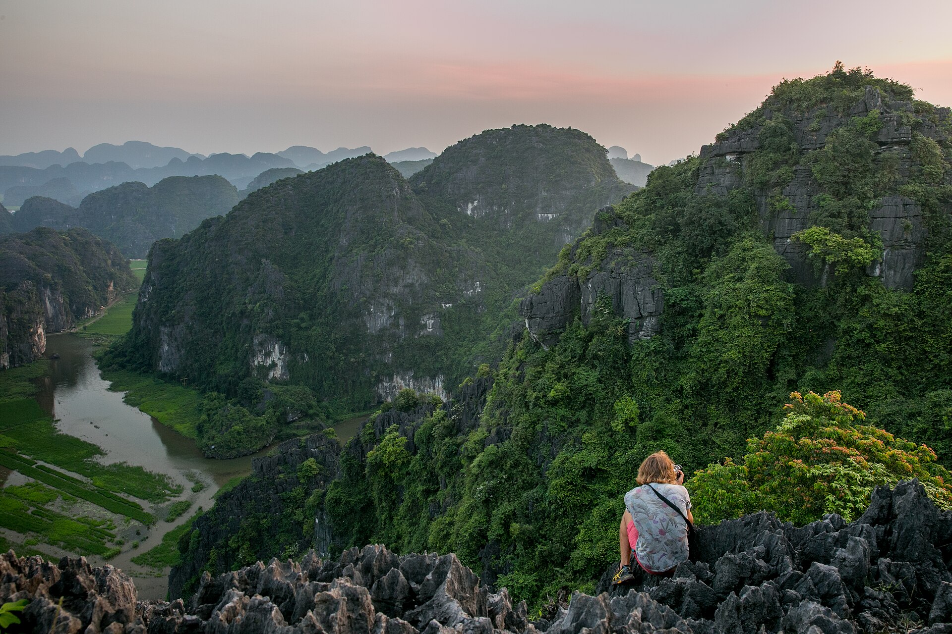 View over the limestone peaks and river of Ninh Binh from Mua Cave